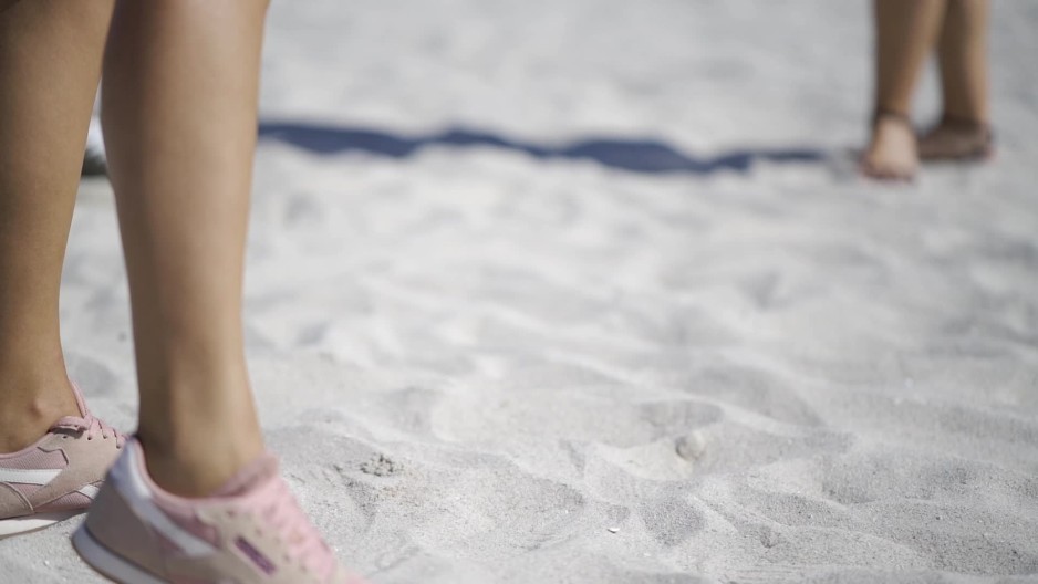 People dancing in sand during day Slow Motion ClipStock