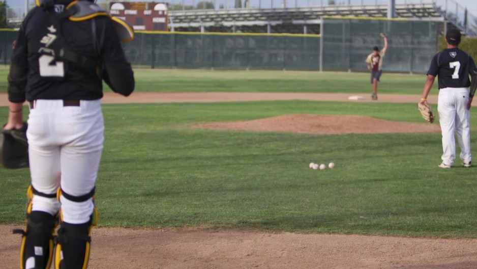 Medium of catcher throwing to second base slow motion ClipStock