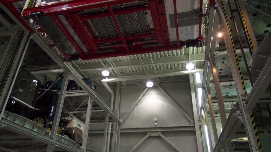 Car on racking system platform moving sideways | ClipStock