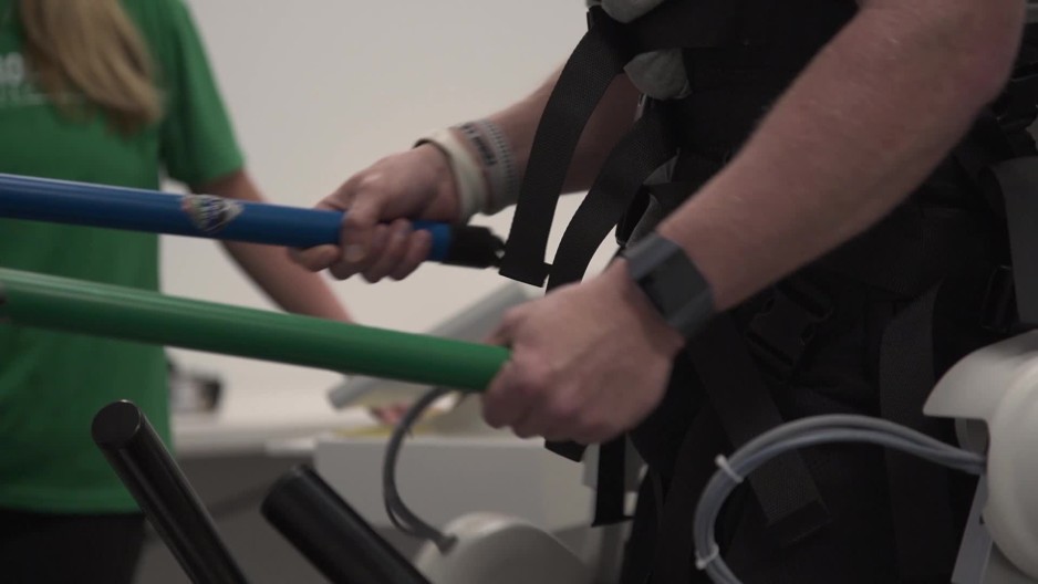paraplegic male patient on unweighting treadmill doing balance exercise