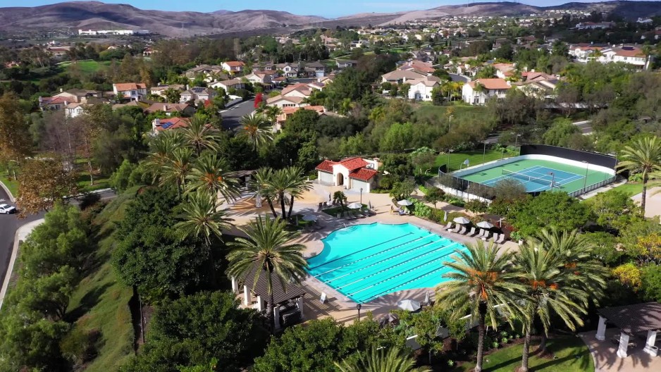 Swimming pool and tennis court at Talega swim and athletic club in