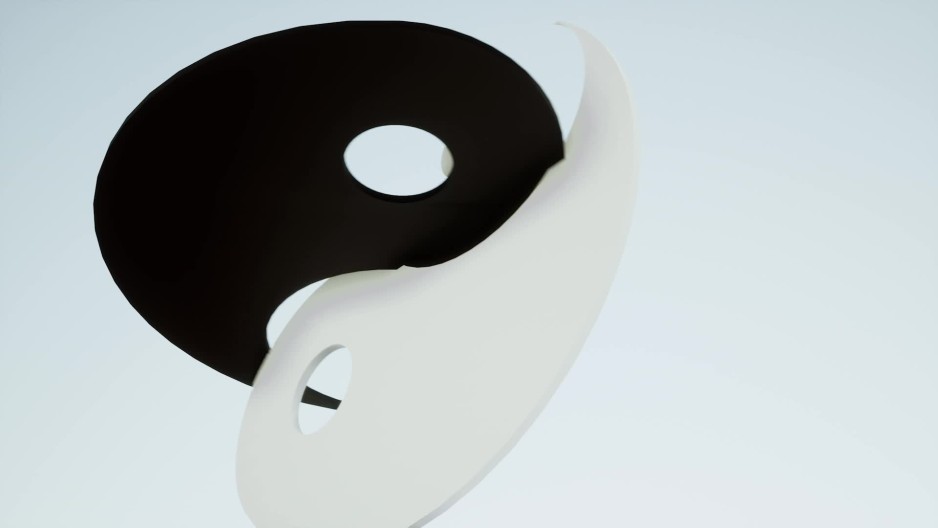 Black and white Yin and Yang symbol spinning from down under Slow