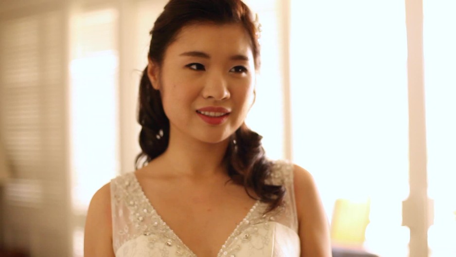 Close up of smiling Asian bride | ClipStock