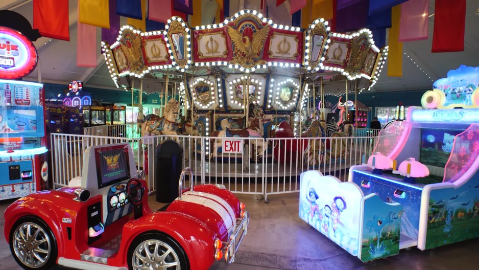 merry go round in arcade | ClipStock