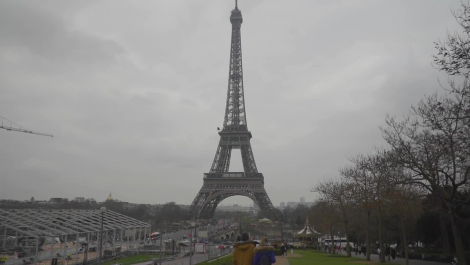 Eiffel Tower in Paris France on a cloudy day | ClipStock