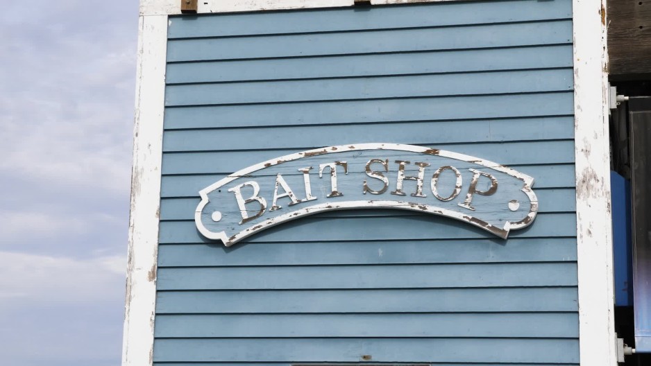 Bait Shop sign on oceanside fishing pier in california ClipStock