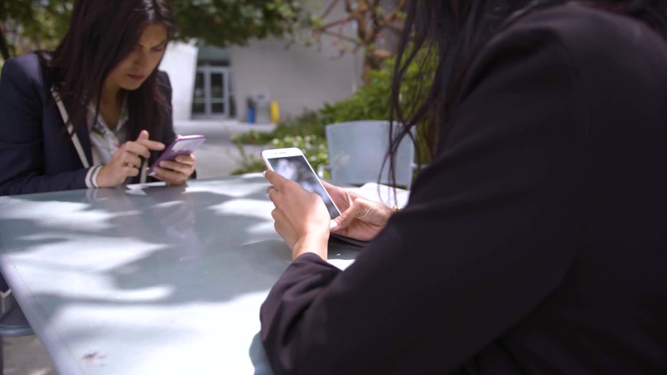 Reveal of women texting slow motion 