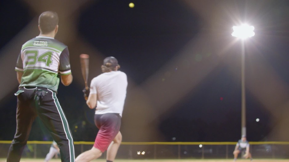 Baseball player hits ball with bat during game ClipStock