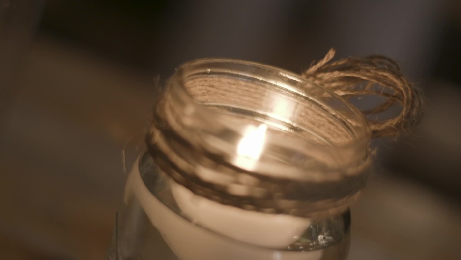 mason jar candle burning Slow Motion ClipStock