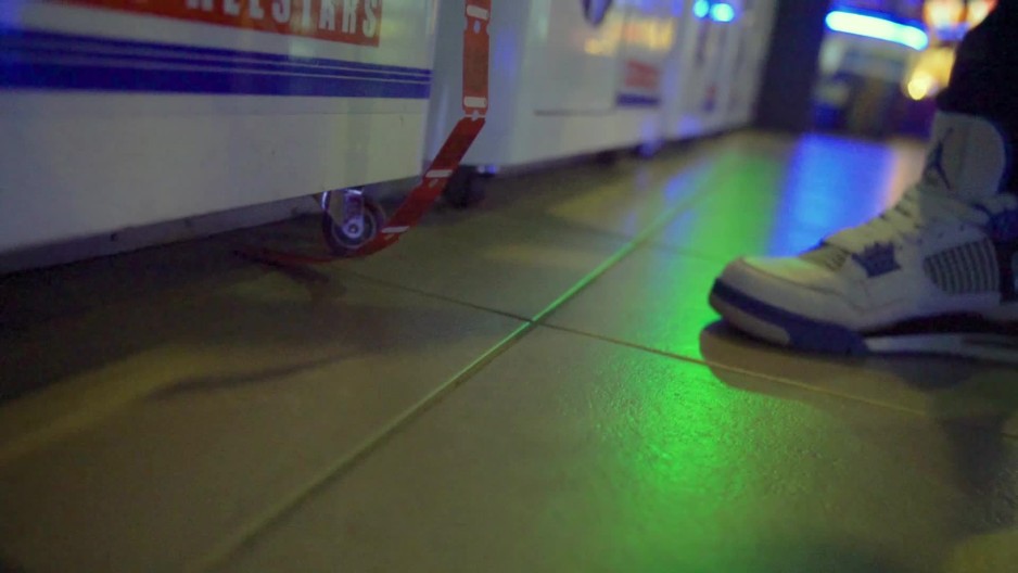 tickets dangling from arcade game - slow motion | ClipStock