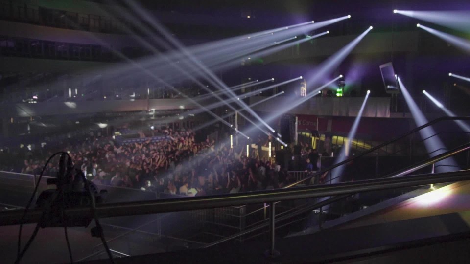 flashing stage lights and crowd at edm concert Slow Motion ClipStock