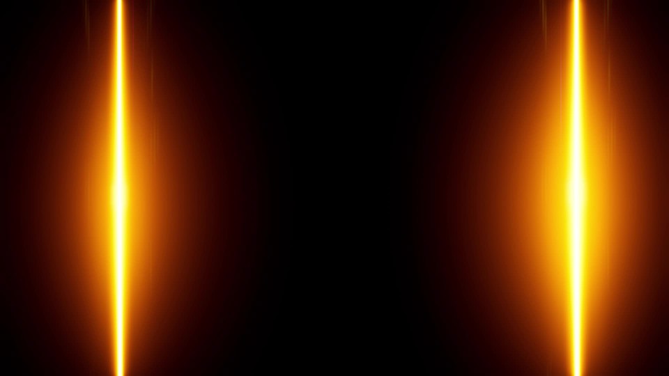 Glowing gold beams of light with scattering energy particles ClipStock