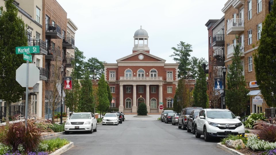 water fountain in front of movie theater in downtown alpharetta