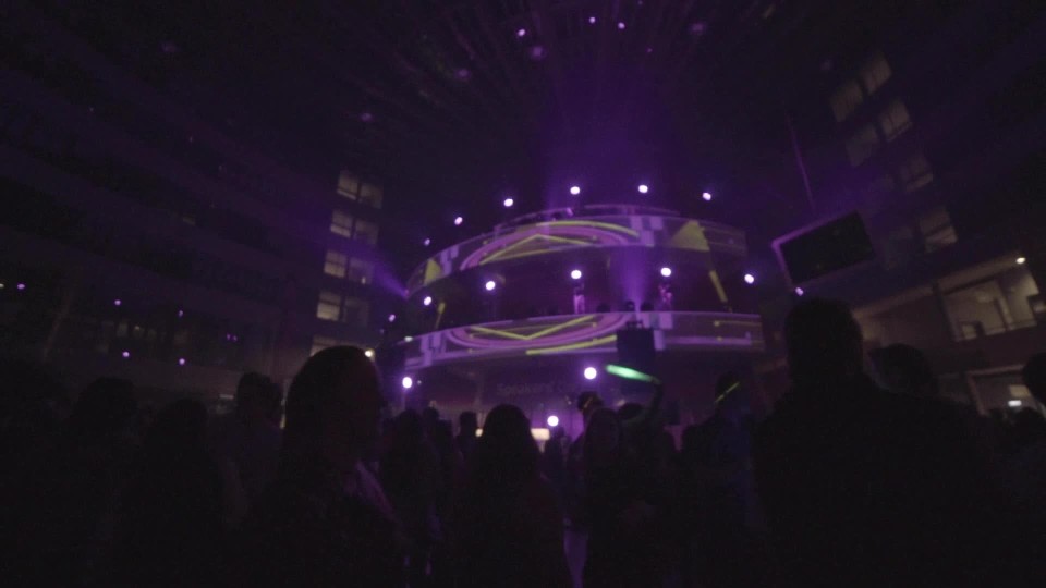 Large edm concert crowd with flashing lights Slow Motion ClipStock