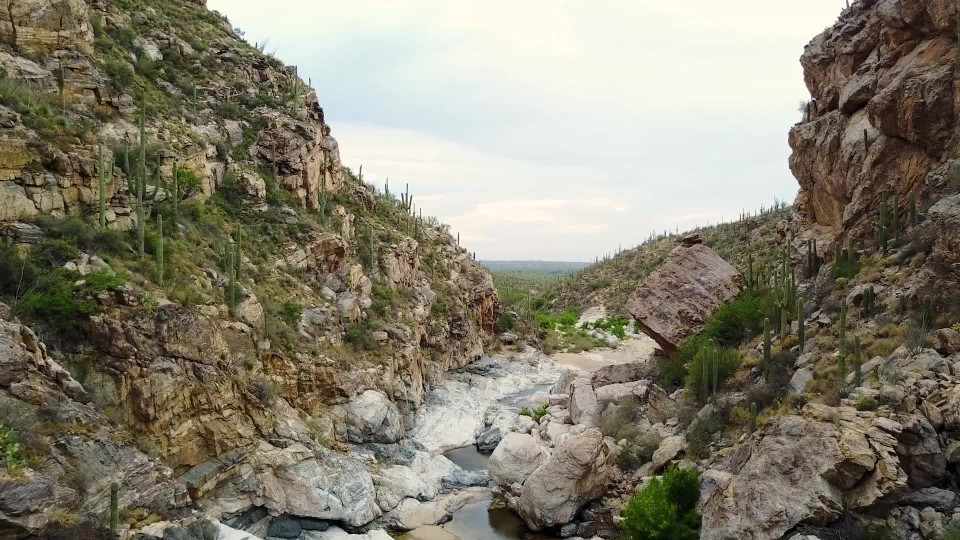 Aerial rise of dried gulch ClipStock