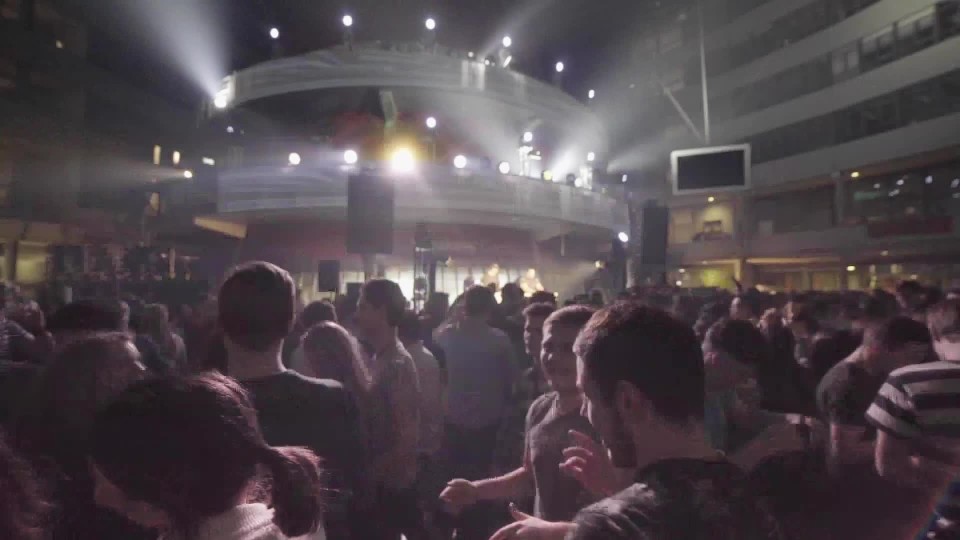 Track left of edm stage lights flashing at concert Slow Motion