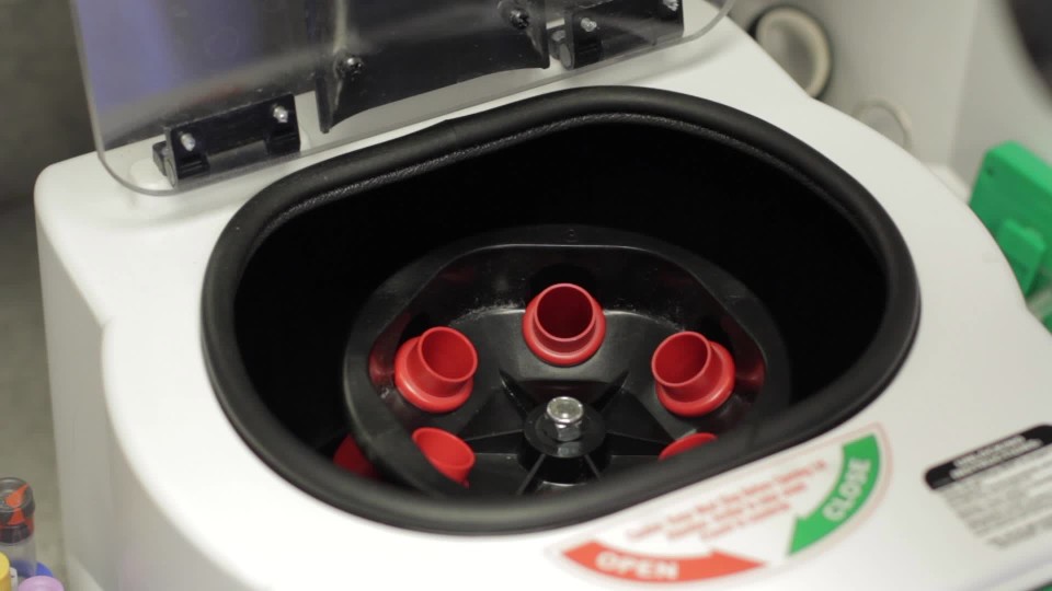 Closing centrifuge lid with sample inside ClipStock