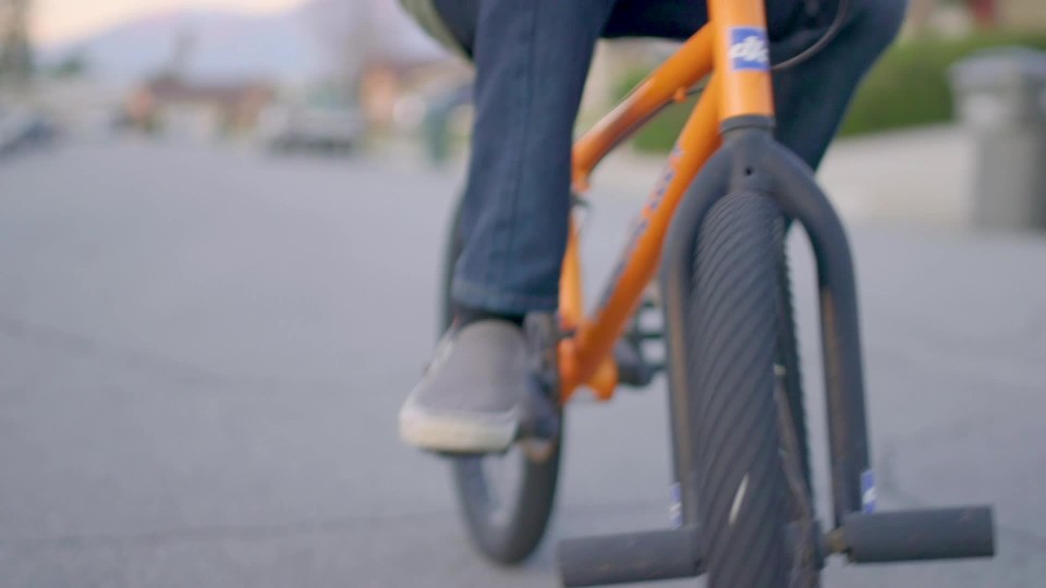 feet pedaling bike ClipStock