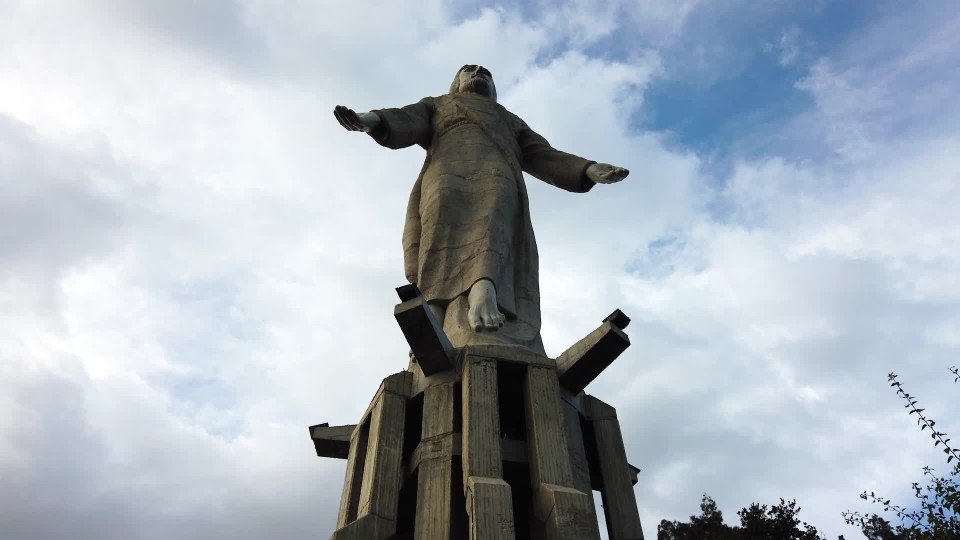 Religious Jesus statue inside of stone fort in Tegucigalpa Honduras