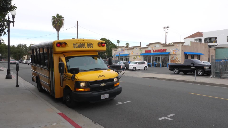 City bus pulling off and driving away Slow Motion ClipStock